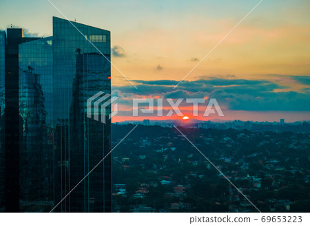Pinheiros River Surrounded by Trees and Offices 69653223