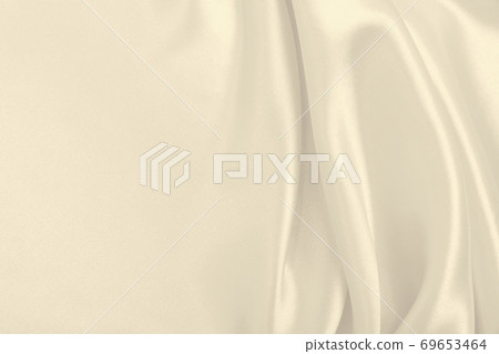 Smooth elegant golden silk or satin luxury cloth texture as wedding background. Luxurious background design. In Sepia toned. Retro style Smooth elegant golden silk or satin luxury cloth texture as wedding background. Luxurious background design. In Sepia toned. Retro style 69653464