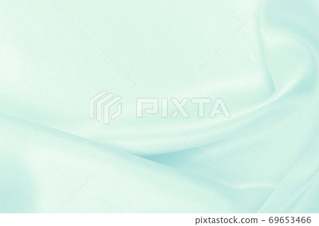 Smooth elegant blue silk or satin luxury cloth texture as abstract background. Luxurious background design Smooth elegant blue silk or satin luxury cloth texture as abstract background. Luxurious background design 69653466