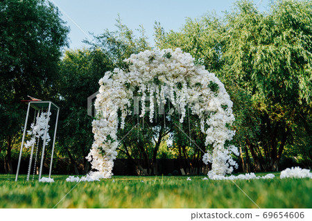 area for outdoor wedding ceremony in the open air. area for outdoor wedding ceremony in the open air. 69654606