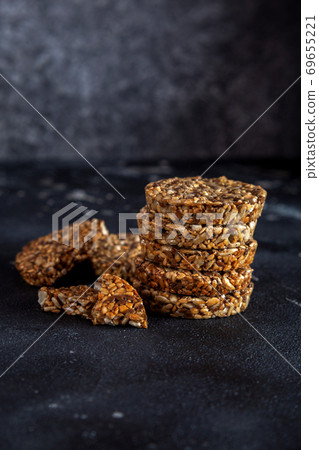 Caramel peanut brittle from sunflower seeds and sesame seeds and fitness cookies with flax seeds Caramel peanut brittle from sunflower seeds and sesame seeds and fitness cookies with flax seeds 69655221