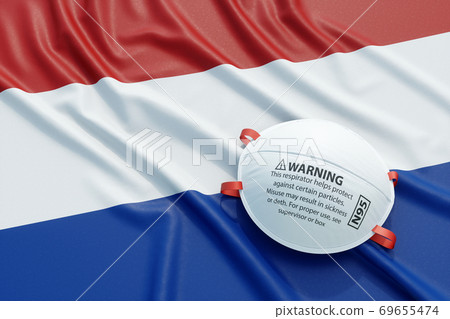 Coronavirus medical surgical face mask on the Dutch national flag 69655474