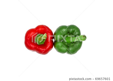 Close up top view of red and green peppers isolated to white background with selective focus Close up top view of red and green peppers isolated to white background with selective focus 69657601