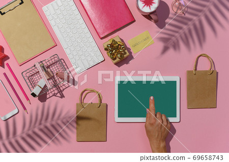 Woman choose and buy cosmetics online flat lay Woman choose and buy cosmetics online flat lay 69658743