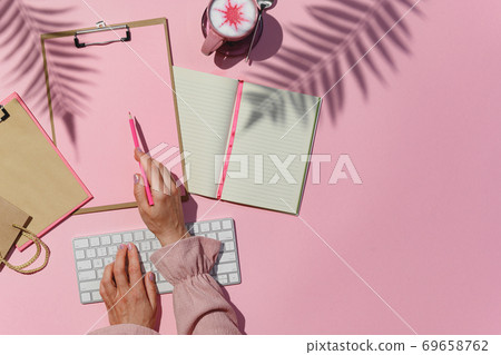 Online woman seller workspace flat lay top view Online woman seller workspace flat lay top view 69658762