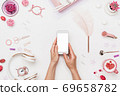 Female workspace for mobile web design creation 69658782