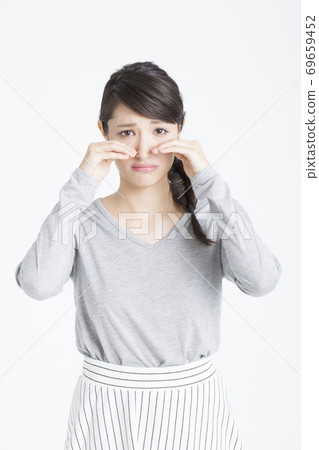 Woman with sad face 69659452