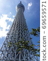 Tower towering above the sky, sky, clouds and greenery 69659571