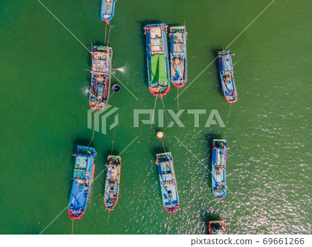 Vietnamese boats on the river. River pollution Vietnamese boats on the river. River pollution 69661266