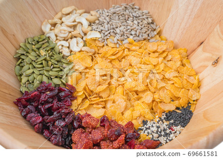Cashew nut, Almond, Pumpkin seeds and Sunflower seed ingredient for Homemade Grains cornflakes Cashew nut, Almond, Pumpkin seeds and Sunflower seed ingredient for Homemade Grains cornflakes 69661581