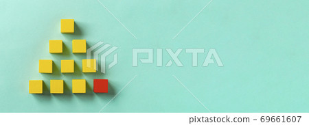 Business material. Pyramid-shaped block. Society, organization, strategy, top-down, foundation, etc. Corner stone. Business material. Pyramid-shaped block. Society, organization, strategy, top-down, foundation, etc. Corner stone. 69661607