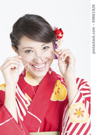Yukata woman with glasses Yukata woman with glasses 69661926