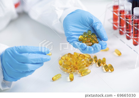 Science, chemistry, biology, and medicine concept, scientist with equipment and science experiments 065 Science, chemistry, biology, and medicine concept, scientist with equipment and science experiments 065 69665030