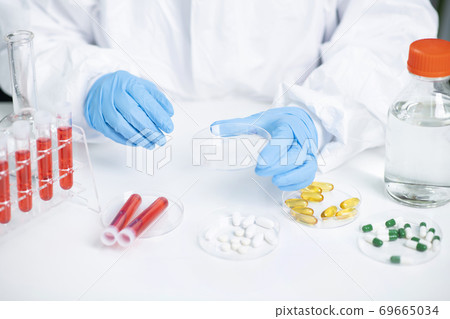 Science, chemistry, biology, and medicine concept, scientist with equipment and science experiments 067 Science, chemistry, biology, and medicine concept, scientist with equipment and science experiments 067 69665034