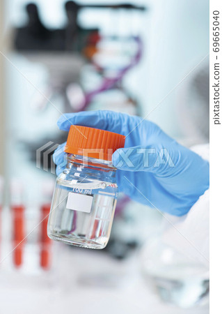 Science, chemistry, biology, and medicine concept, scientist with equipment and science experiments 070 Science, chemistry, biology, and medicine concept, scientist with equipment and science experiments 070 69665040