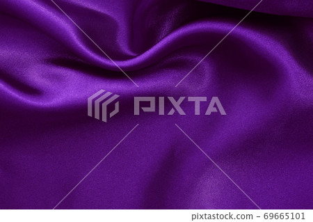 Purple fabric cloth texture for background and design art work, beautiful crumpled pattern of silk or linen. Purple fabric cloth texture for background and design art work, beautiful crumpled pattern of silk or linen. 69665101