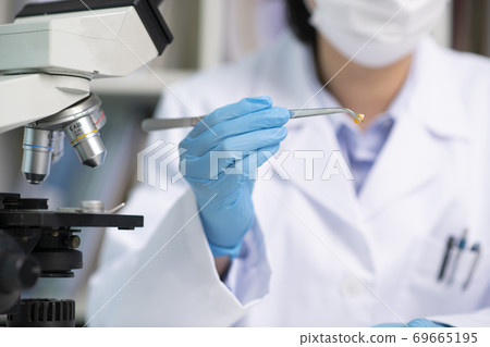 Science, chemistry, biology, and medicine concept, scientist with equipment and science experiments 178 69665195