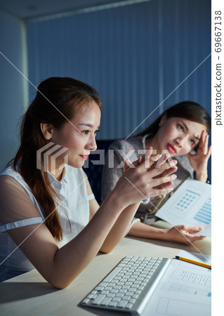 Tired project managers finishing project 69667138