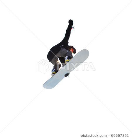 Isolated on white background girl snowboarder doing a jump trick on a snowboard 69667861