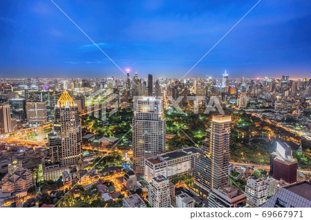 Bangkok Thailand, night city skyline of skyscraper at Bangkok downtown and Lumpini Park Bangkok Thailand, night city skyline of skyscraper at Bangkok downtown and Lumpini Park 69667971