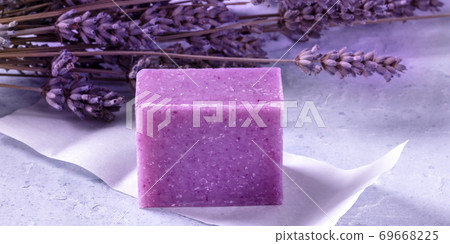Lavender soap with dried lavender flowers Lavender soap with dried lavender flowers 69668225