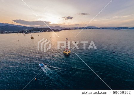 The cable car at Nha Trang beach. Aerial view from drone 69669192