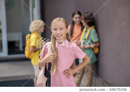Four kids spending time together after school Four kids spending time together after school 69670206