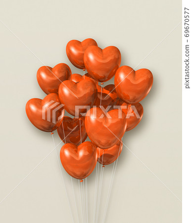 Orange heart shape air balloons group on a beige background Orange heart shape air balloons group on a beige background 69670577