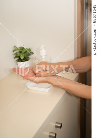 Corona measures sterilization gel at the front door 69671649