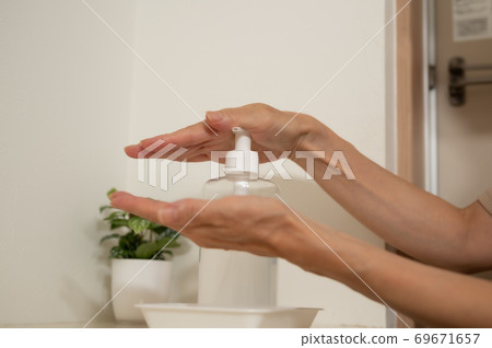 Corona measures sterilization gel at the front door 69671657