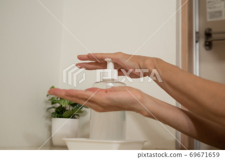 Corona measures sterilization gel at the front door 69671659