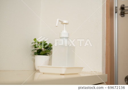 Corona measures Alcohol sterilization at the front door 69672136