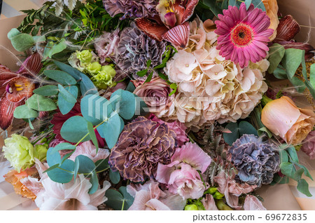 Background of bouquet of different flowers close-up, wedding and festive concept 69672835