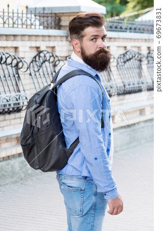 Travel to make memories. Bearded man travel in modern city. Hipster Travel to make memories. Bearded man travel in modern city. Hipster 69673831