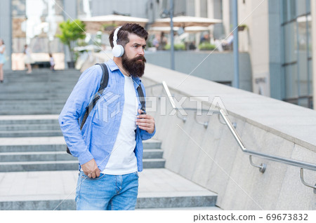 Daily route to work. Modern life. Change of scenery concept. Handsome hipster Daily route to work. Modern life. Change of scenery concept. Handsome hipster 69673832