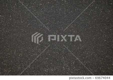 Black texture with micro-relief and glitter. Black glitter texture Black texture with micro-relief and glitter. Black glitter texture 69674044