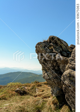 Large stones on the tops of the Carpathians, epic and breathtaking view. Large stones on the tops of the Carpathians, epic and breathtaking view. 69675063