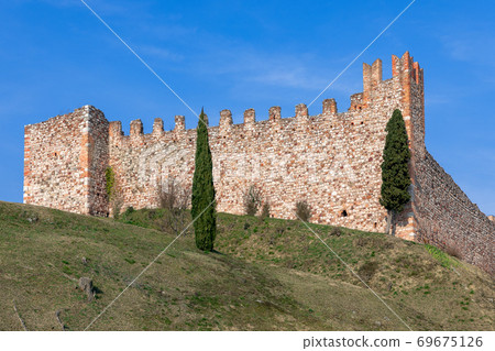 Wall of a medieval castle (Castello di Padenghe) on the hill. City Padenghe, near Lake Garda, Italy 69675126