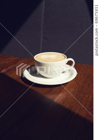 Cup of appuccino Cup of appuccino 69675931