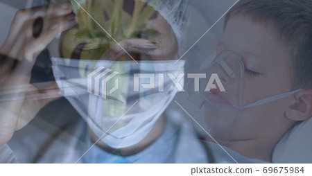 Digital illustration of a doctor wearing a face mask over a child patient lying in a bed Digital illustration of a doctor wearing a face mask over a child patient lying in a bed 69675984