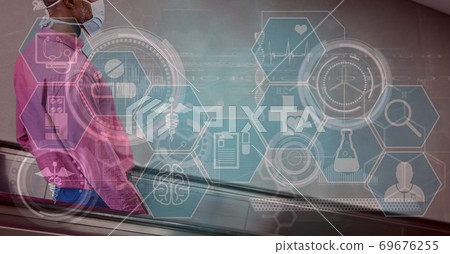 Digital illustration of a man wearing coronavirus Covid19 mask over medical icons Digital illustration of a man wearing coronavirus Covid19 mask over medical icons 69676255