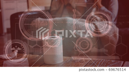 Digital illustration of two people sitting on a couch with a toilet paper roll standing in front of Digital illustration of two people sitting on a couch with a toilet paper roll standing in front of 69676514