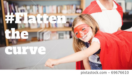 Caucasian man and girl wearing capes with words Flatten the Curve during coronavirus covid19 pandemi 69676610