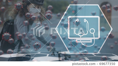 Covid-19 cells and medical icon against woman wearing face mask coughing 69677350