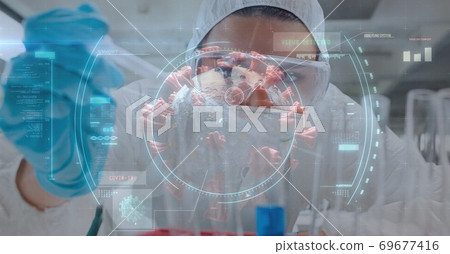 Scope scanning Covid-19 cells against scientist working in laboratory Scope scanning Covid-19 cells against scientist working in laboratory 69677416