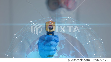 Globe with a web of connections against doctor using electronic thermometer Globe with a web of connections against doctor using electronic thermometer 69677579