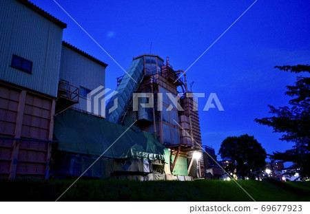 Factory at night 69677923