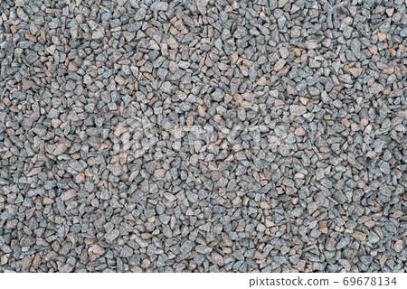 Crushed stone close up, gray granite, gravel for construction. Texture. Crushed stone close up, gray granite, gravel for construction. Texture. 69678134