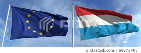 Flying flags of the European Union and Luxembourg on sky background, 3d rendering Flying flags of the European Union and Luxembourg on sky background, 3d rendering 69678403