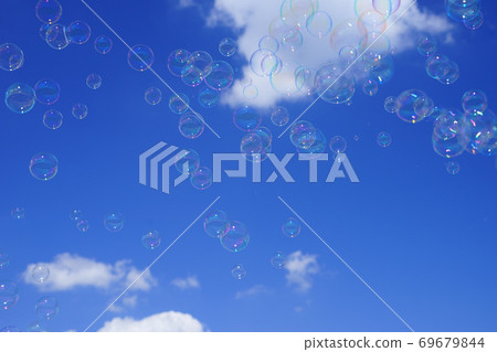 Soap bubbles in the blue sky 2 69679844